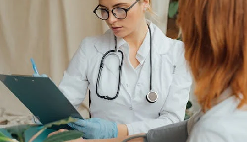 Doctor Looking at sheet