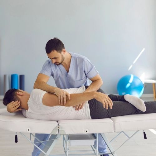 Pelvic Floor Therapist. helping male patient