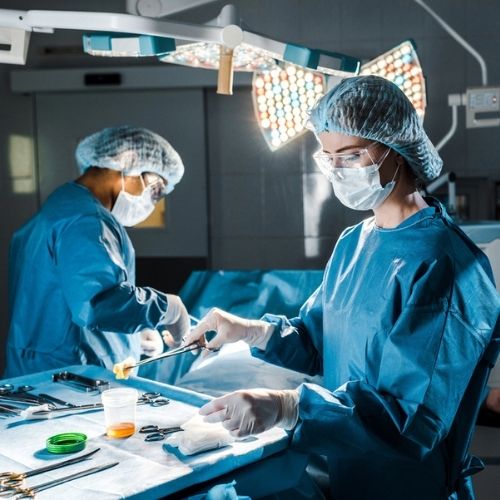 Surgeons operating Prostate artery embolization general anesthesia
